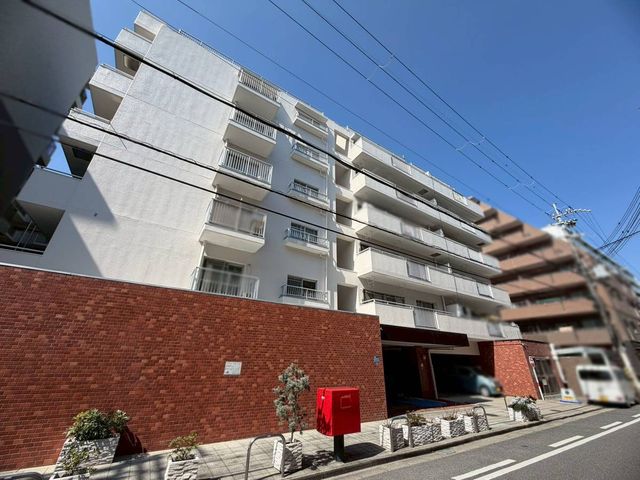 �ޗǌ��ޗǎs���厛������1���ڂ̒��Ã}���V�����̌��n�O�ώʐ^