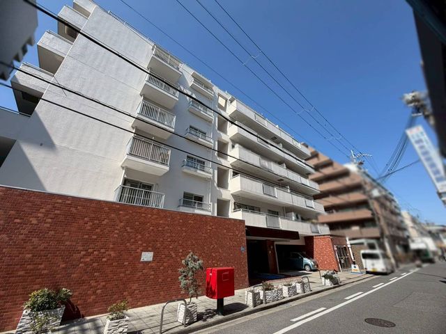 �ޗǌ��ޗǎs���厛������1���ڂ̒��Ã}���V�����̌��n�O�ώʐ^